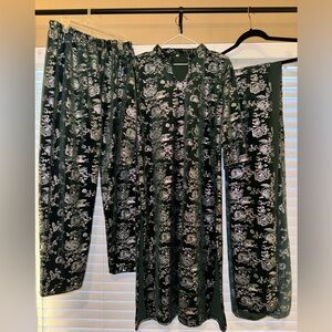 A Warm M Readymade Velvet Straight Suit in the color Dark Green for Women/Girls